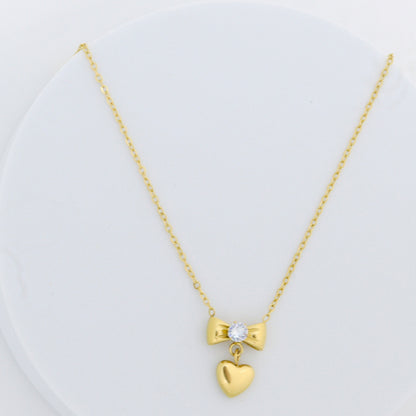 Bow & Heart Gold Pendant