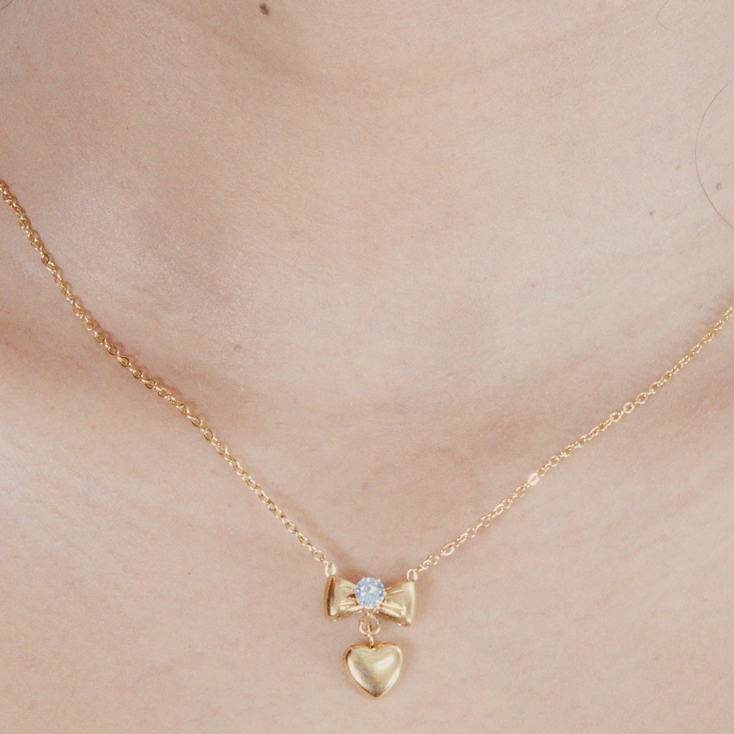 Bow & Heart Gold Pendant