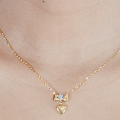 Bow & Heart Gold Pendant